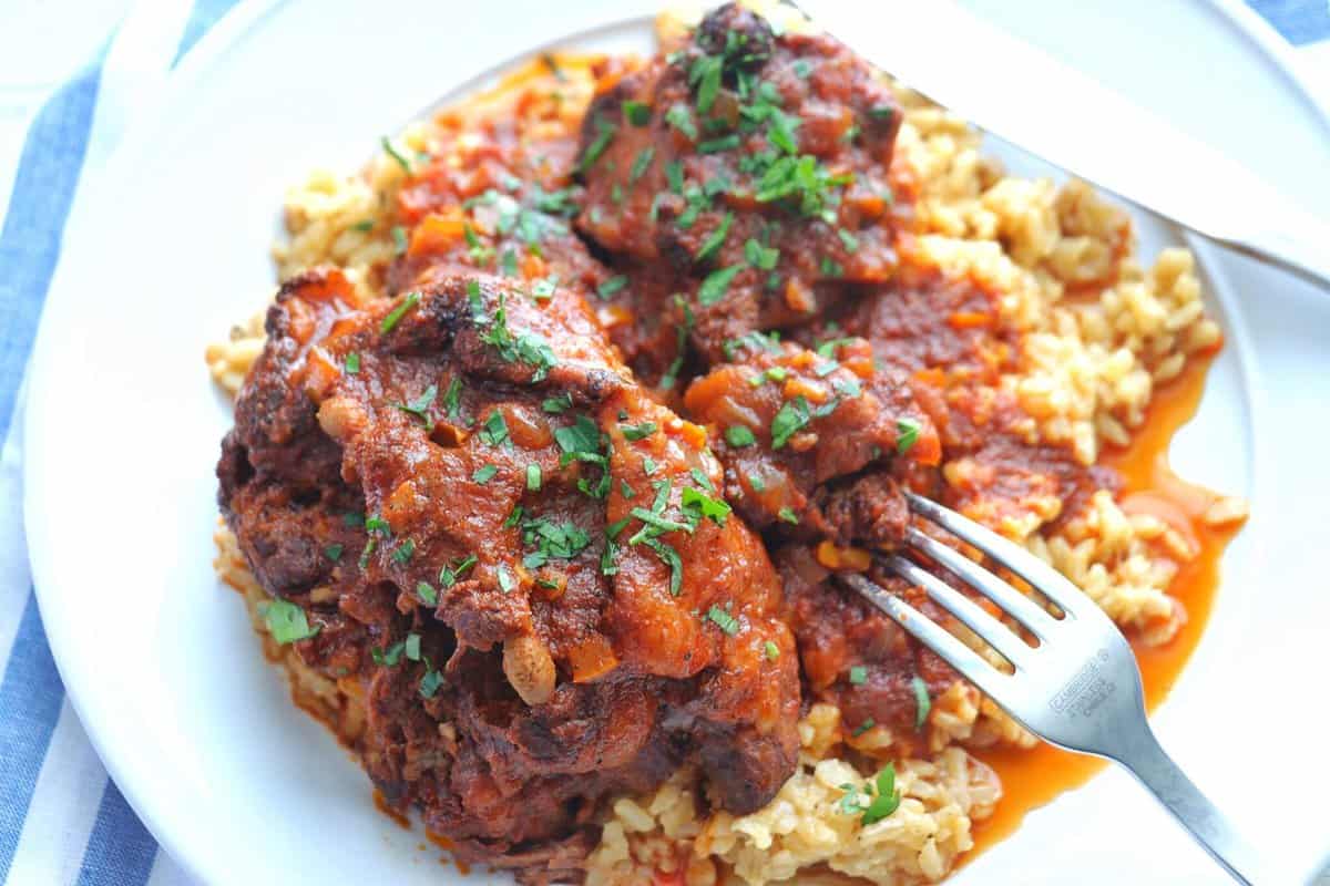 Creole Oxtails Stew on plate with fork