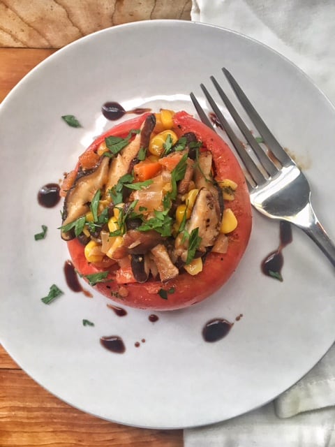 Stuffed Vegan Tomato on a plate
