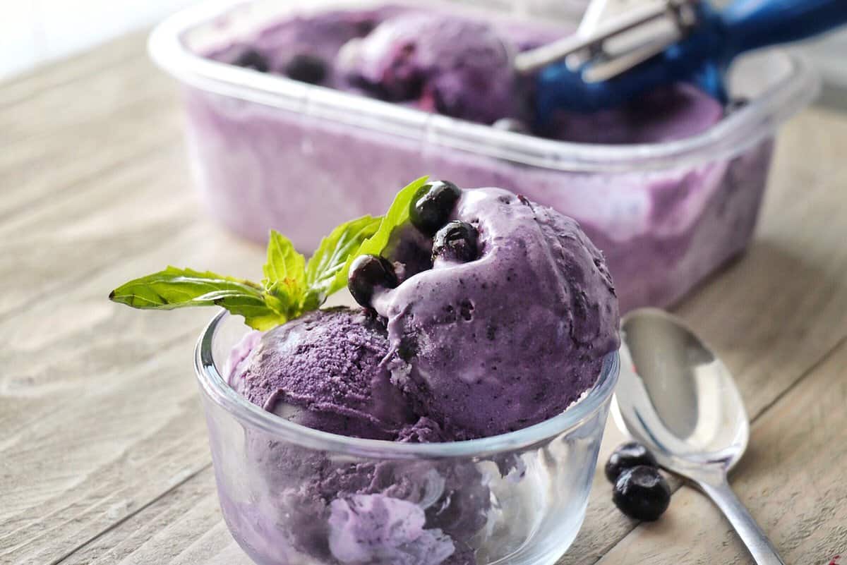 blueberry basil ice cream in a bowl.