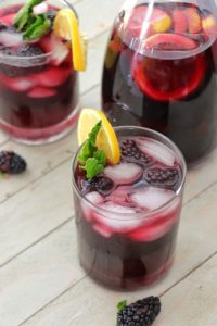 Blackberry mint sangria in glasses.