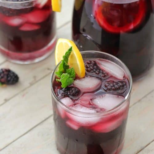 Blackberry mint sangria in glasses.