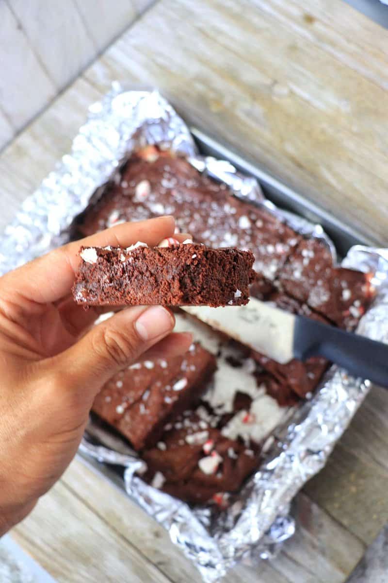 Peppermint Brownies being held in a hand