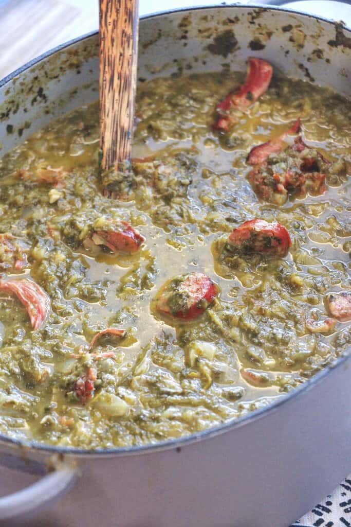 Gumbo Z’herbes in a pot with wooden cooking spoon