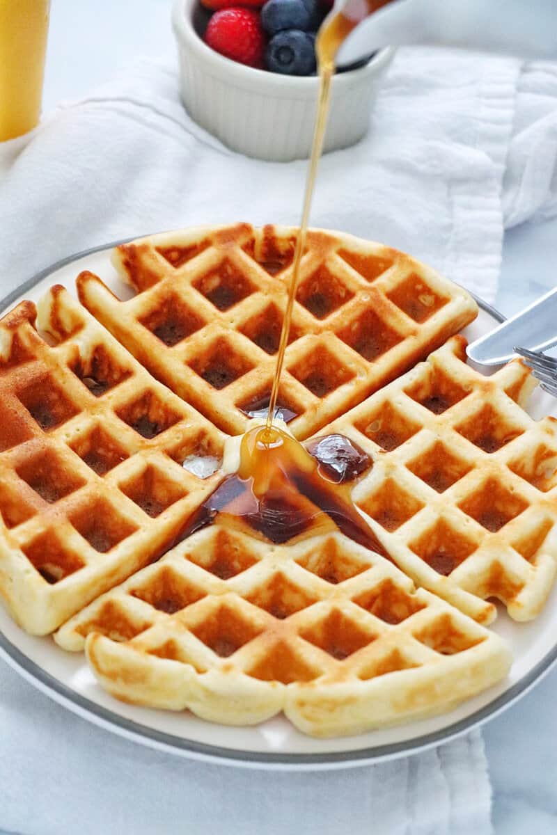 Buttermilk Waffles with syrup pour