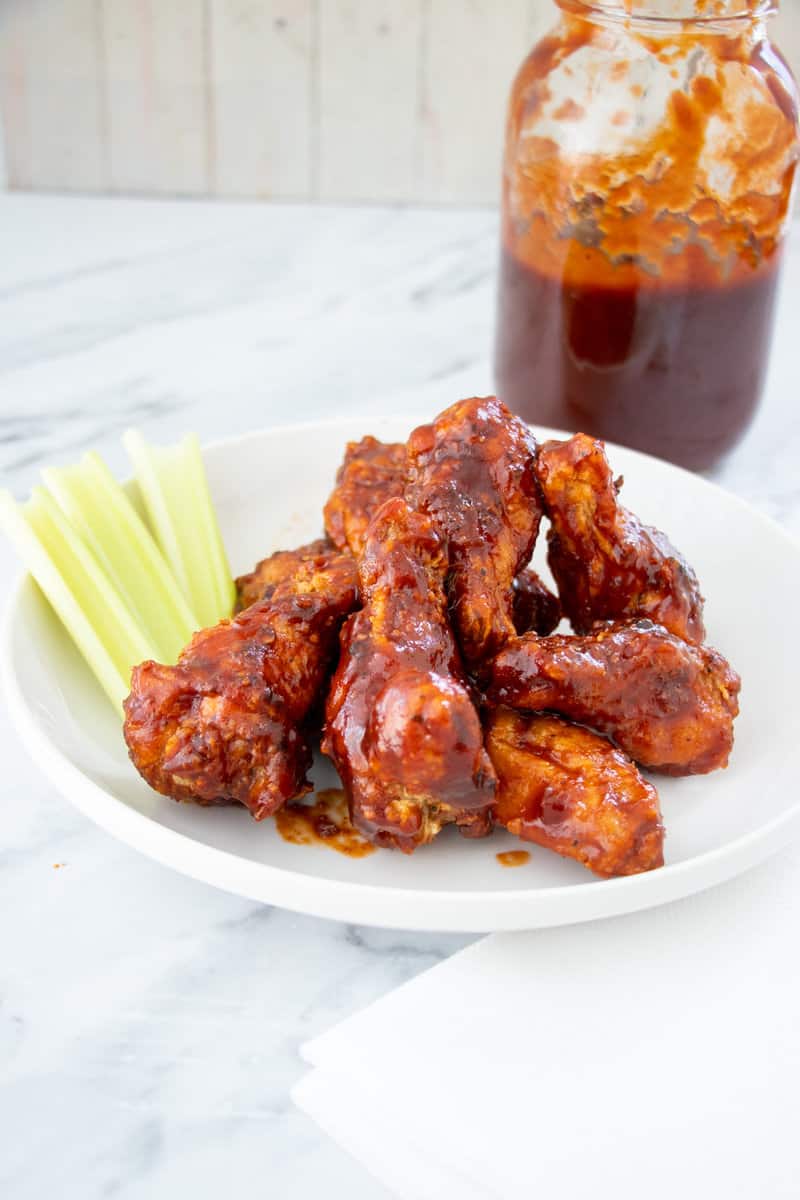 Honey BBQ Wing with sauce in mason jar