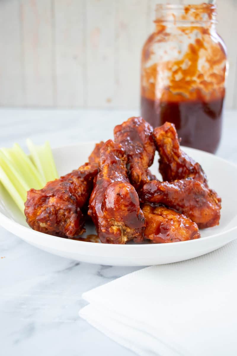 Honey BBQ Wing with sauce in mason jar