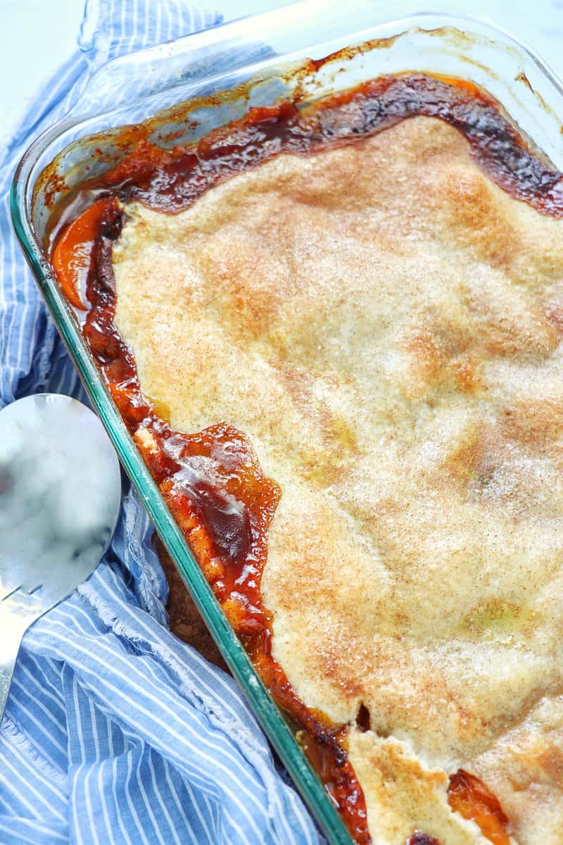 Peach cobbler in the pan over head shot