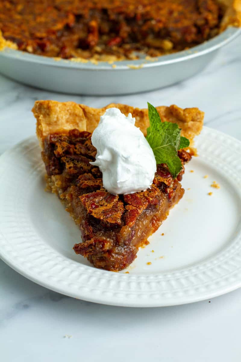 Slice of Pecan Pie with whipped cream