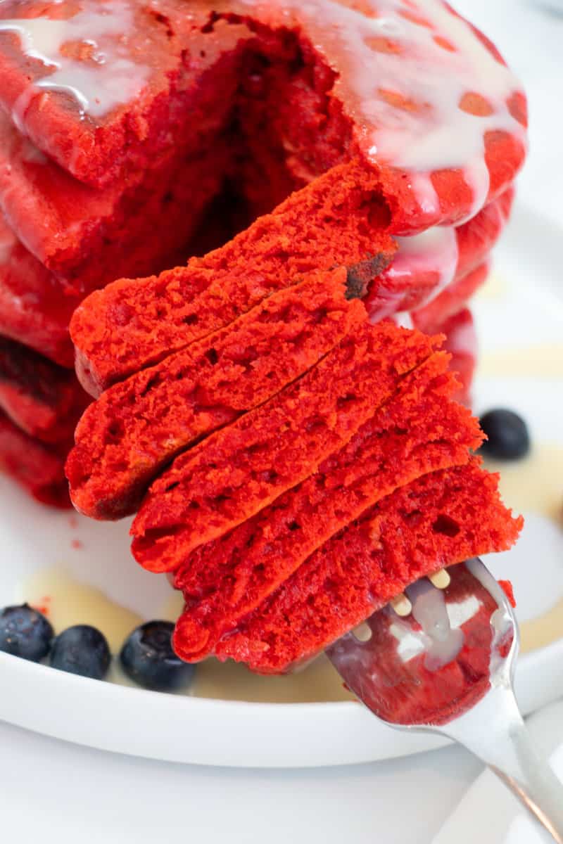 pieces of red velvet pancakes on a fork