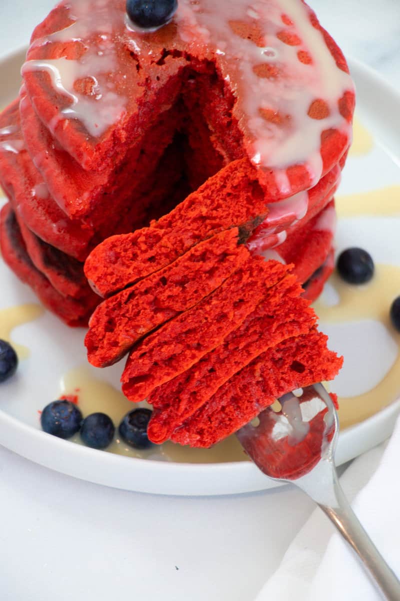 pieces of red velvet pancakes on a fork