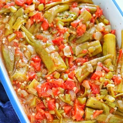 Stewed Okra and Tomatoes in a blue and white baking dish