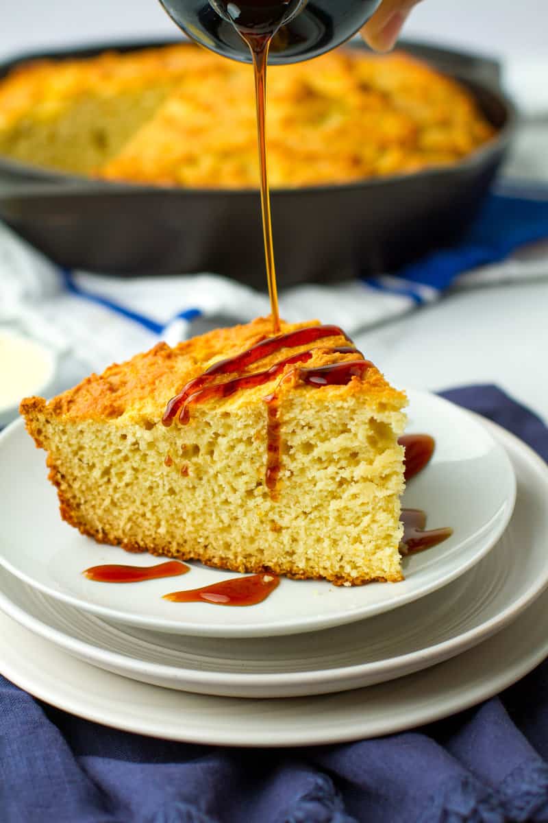 Sweet Southern Cornbread with syrup pour