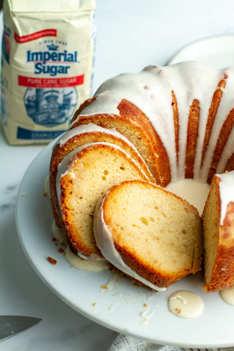 Rum cake sliced on a cake stand
