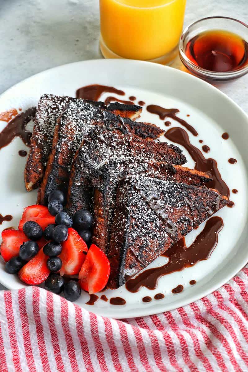 Chocolate French Toast with maple syrup and orange juice