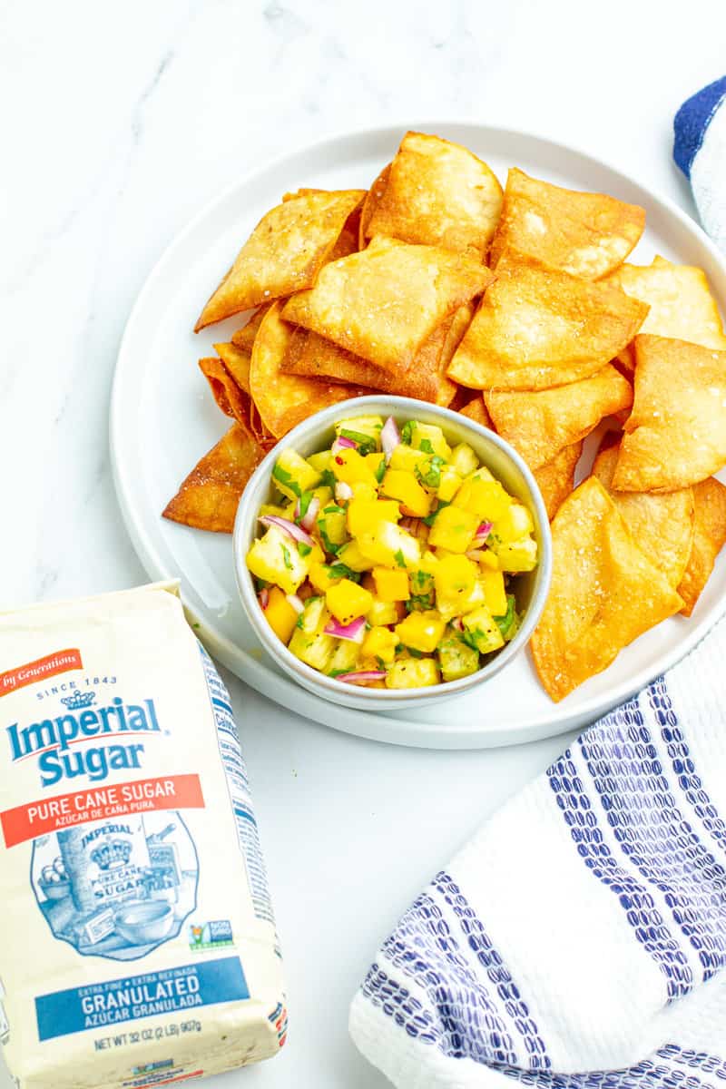 Pineapple Mango Salsa on a plate with chips