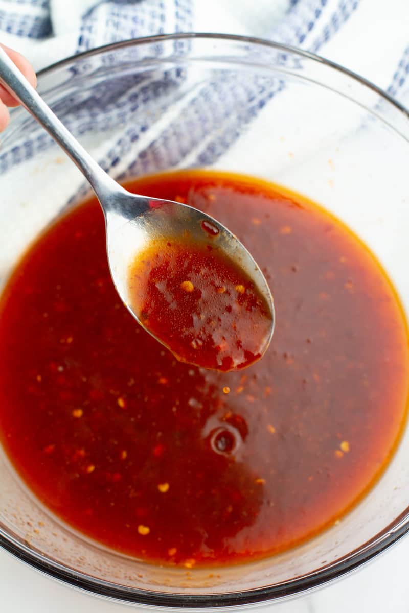 Honey Sriracha Sauce on a spoon