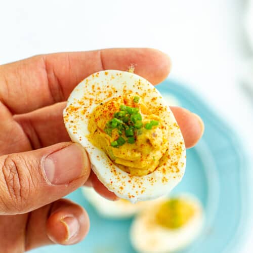 Cajun Deviled Egg in a hand.