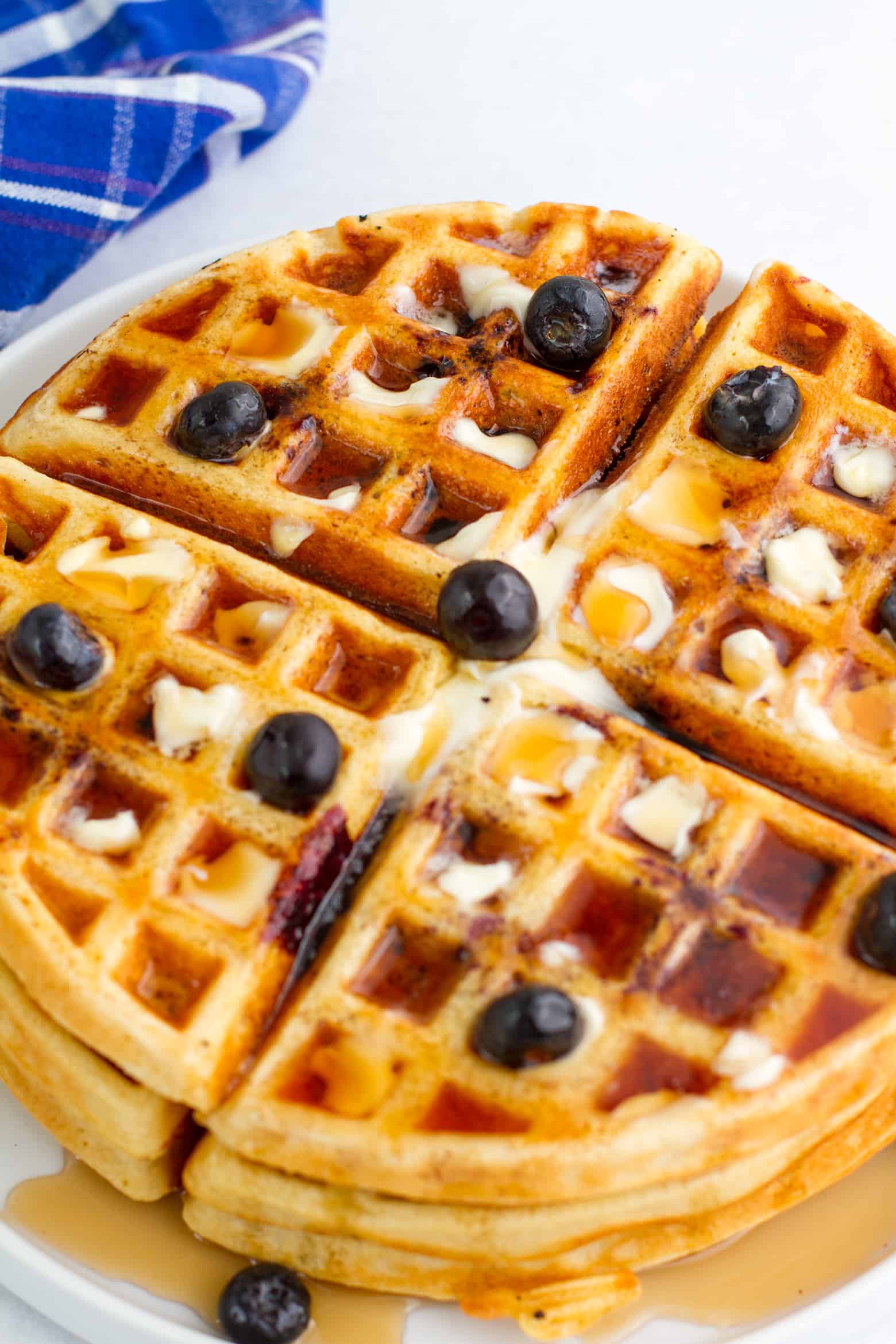 Close up shot of blueberry waffles.