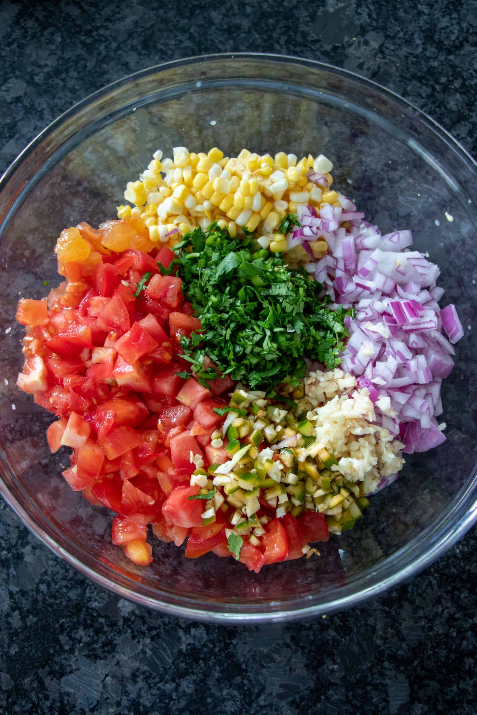 Tomato Corn Salsa ingredients in a bowl.