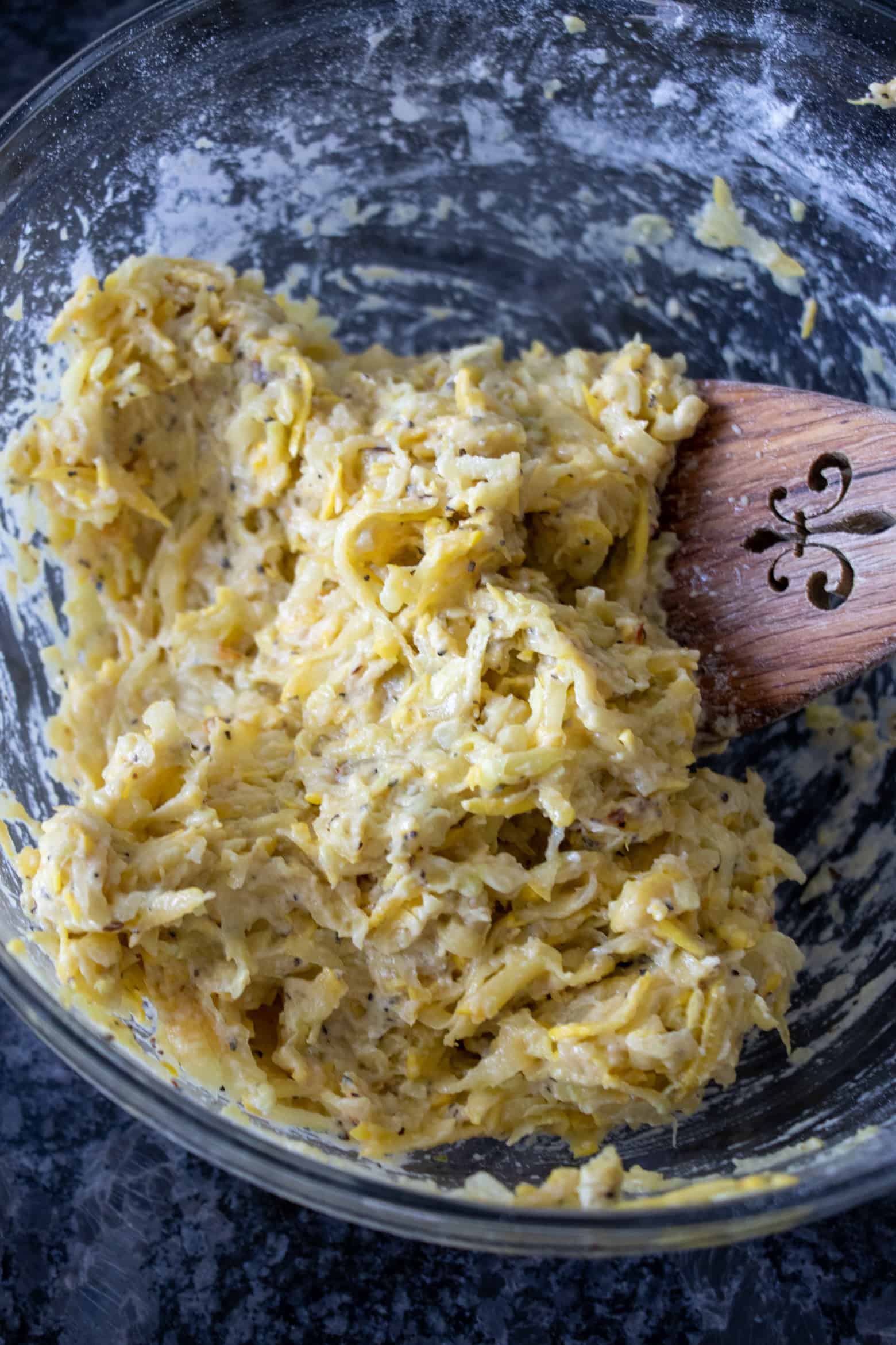 Yellow Squash Fritters mixed in a bowl before frying.
