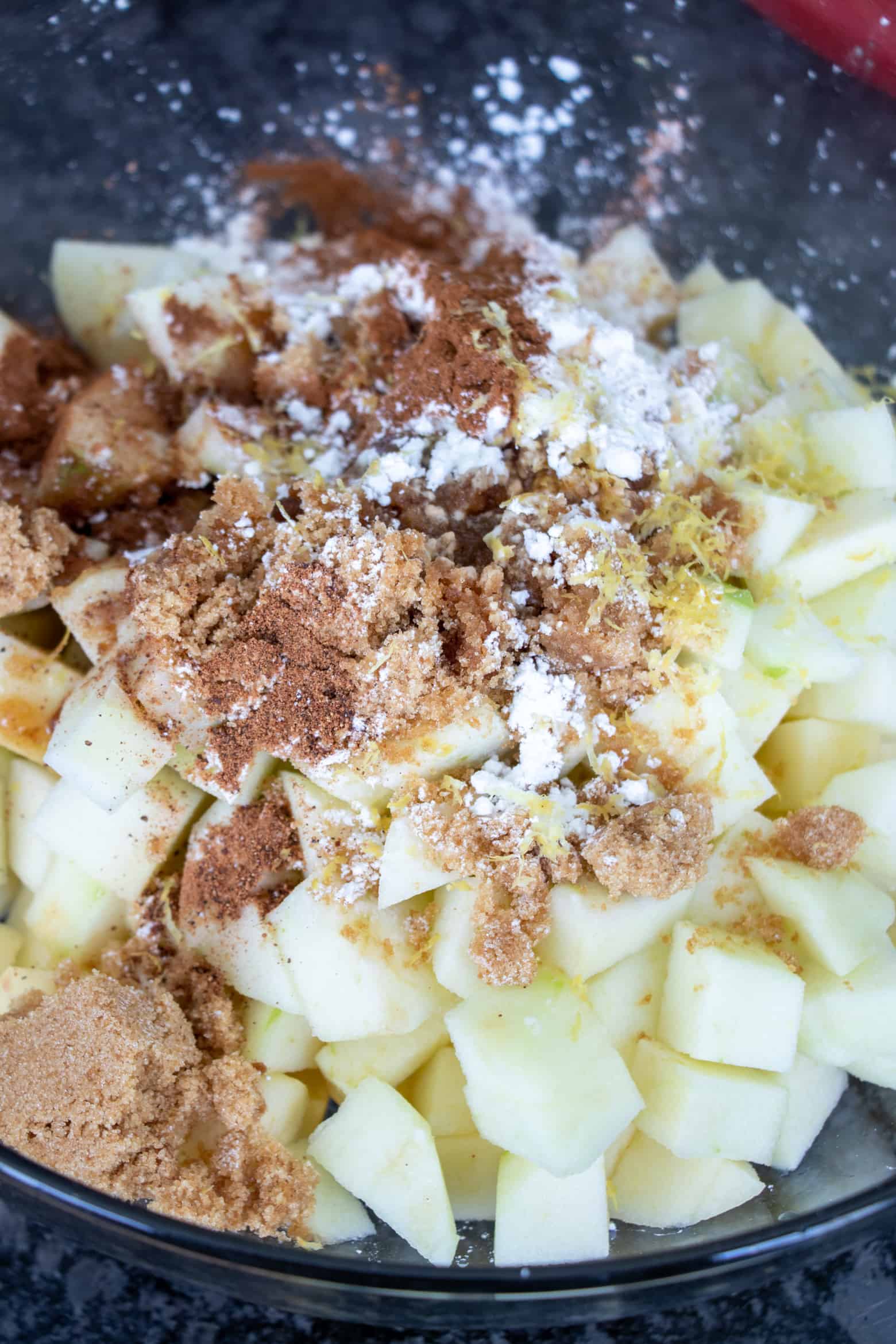 apples in a bowl with spices.
