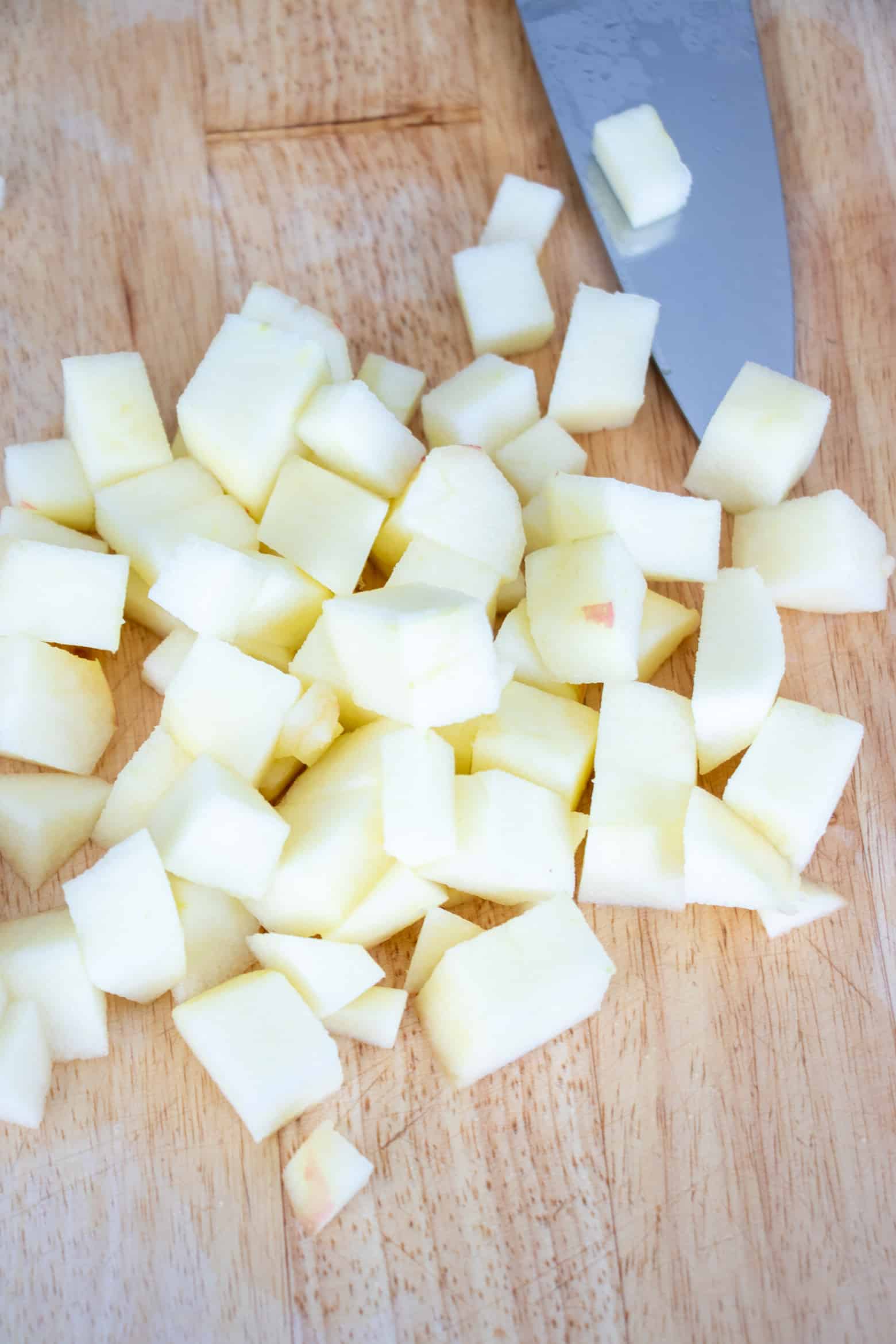 chopped apples on a cutting board