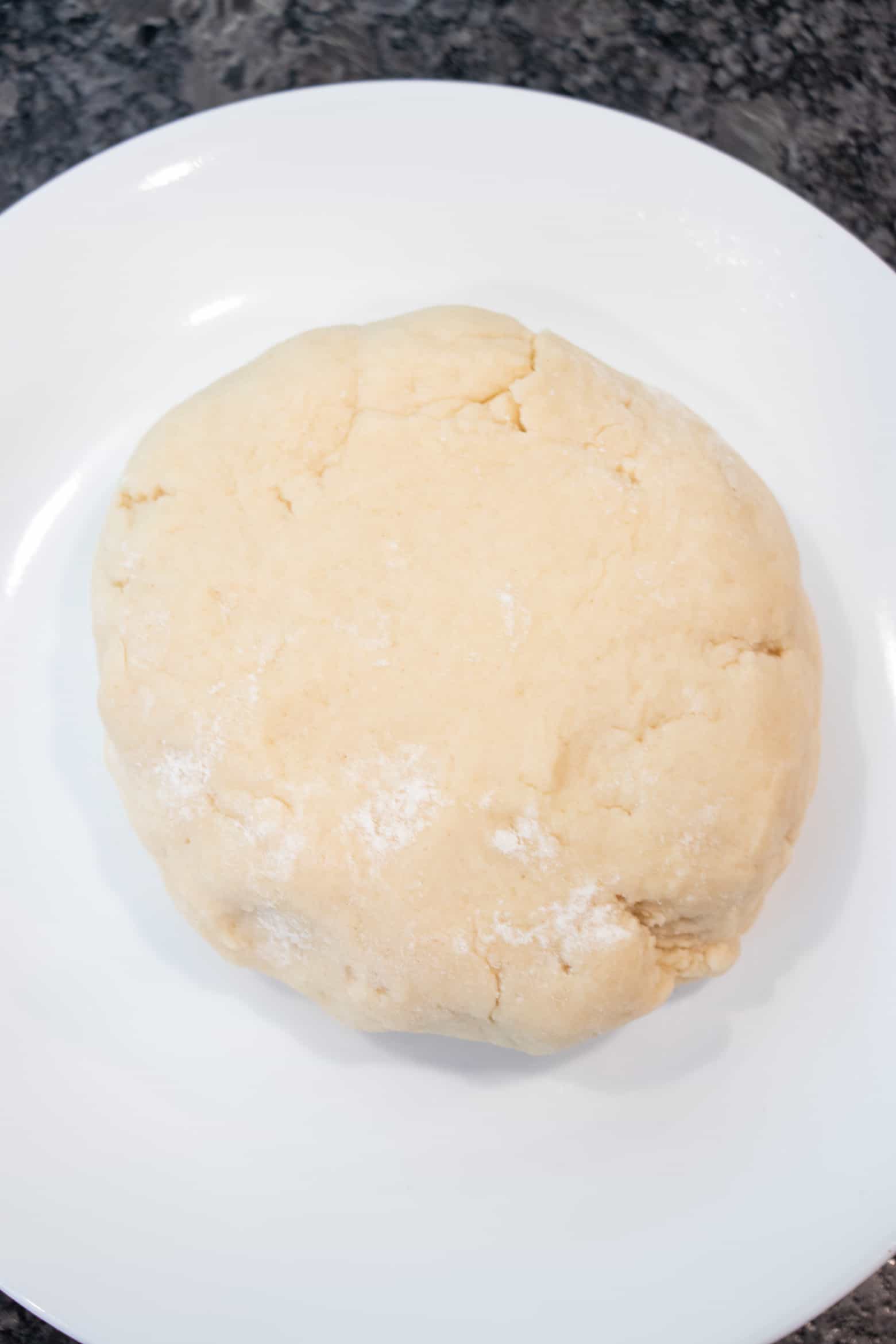 Pie dough on a plate.