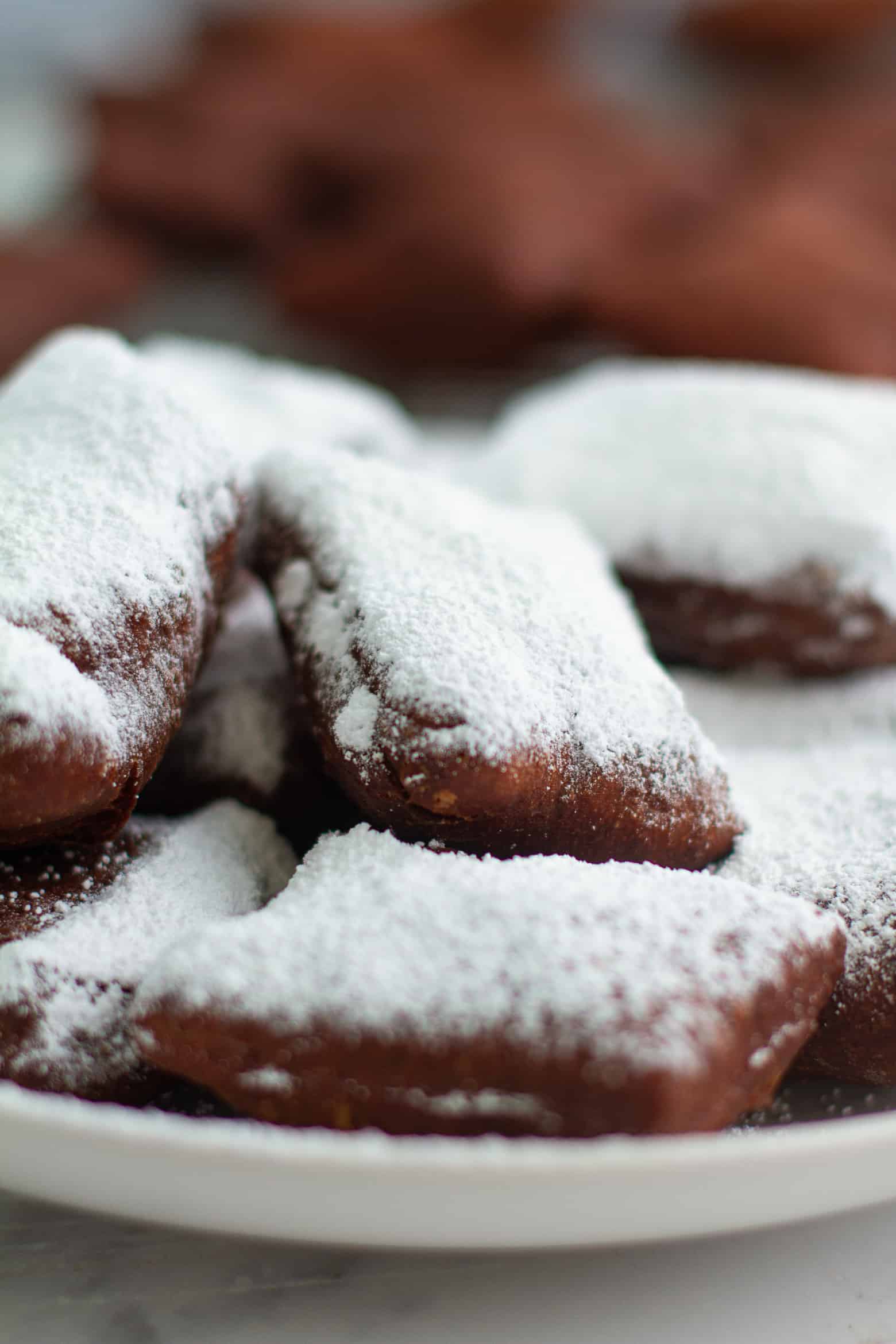 Chocolate Beignets on a plate.