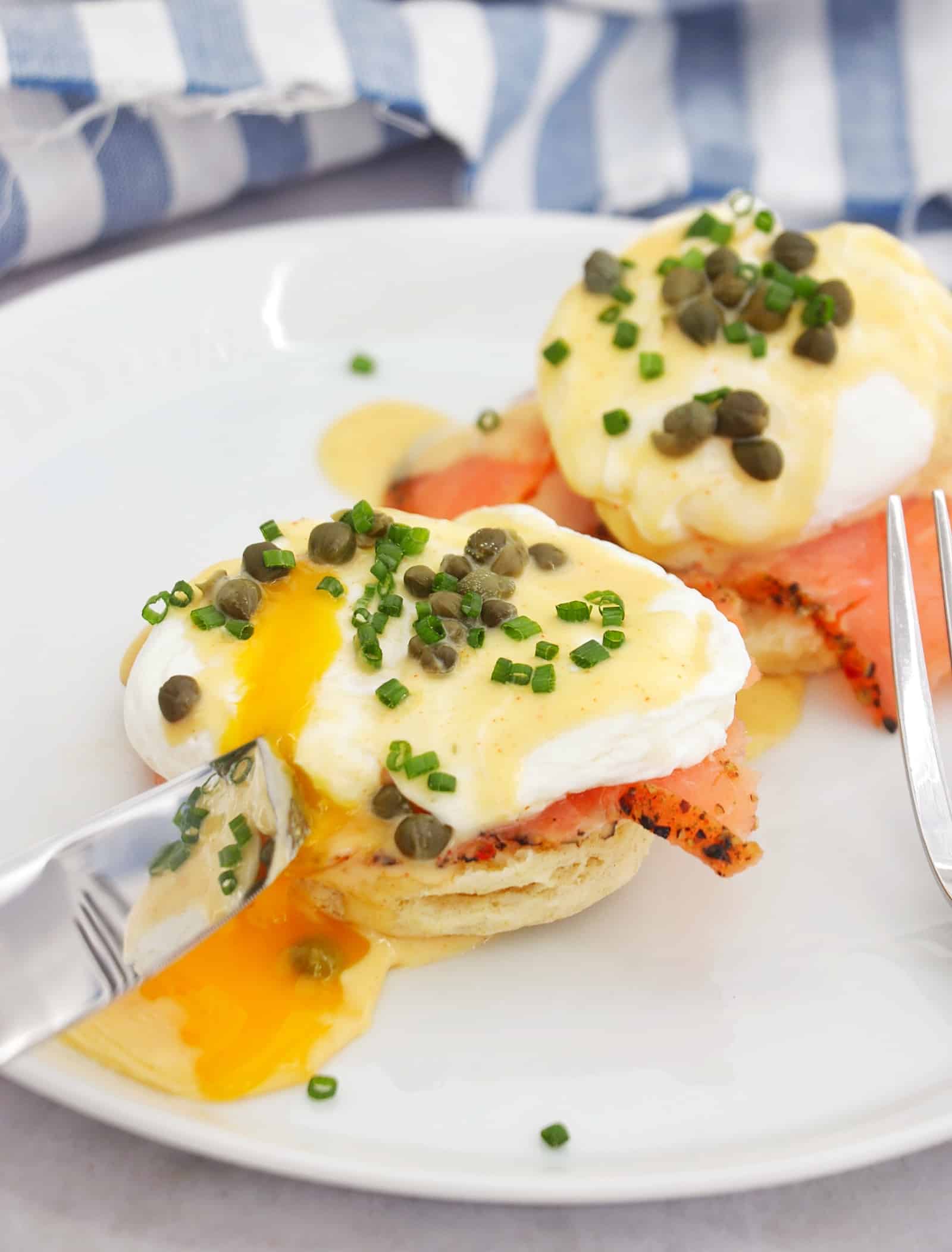 lox benedict on a plate. with a runny egg