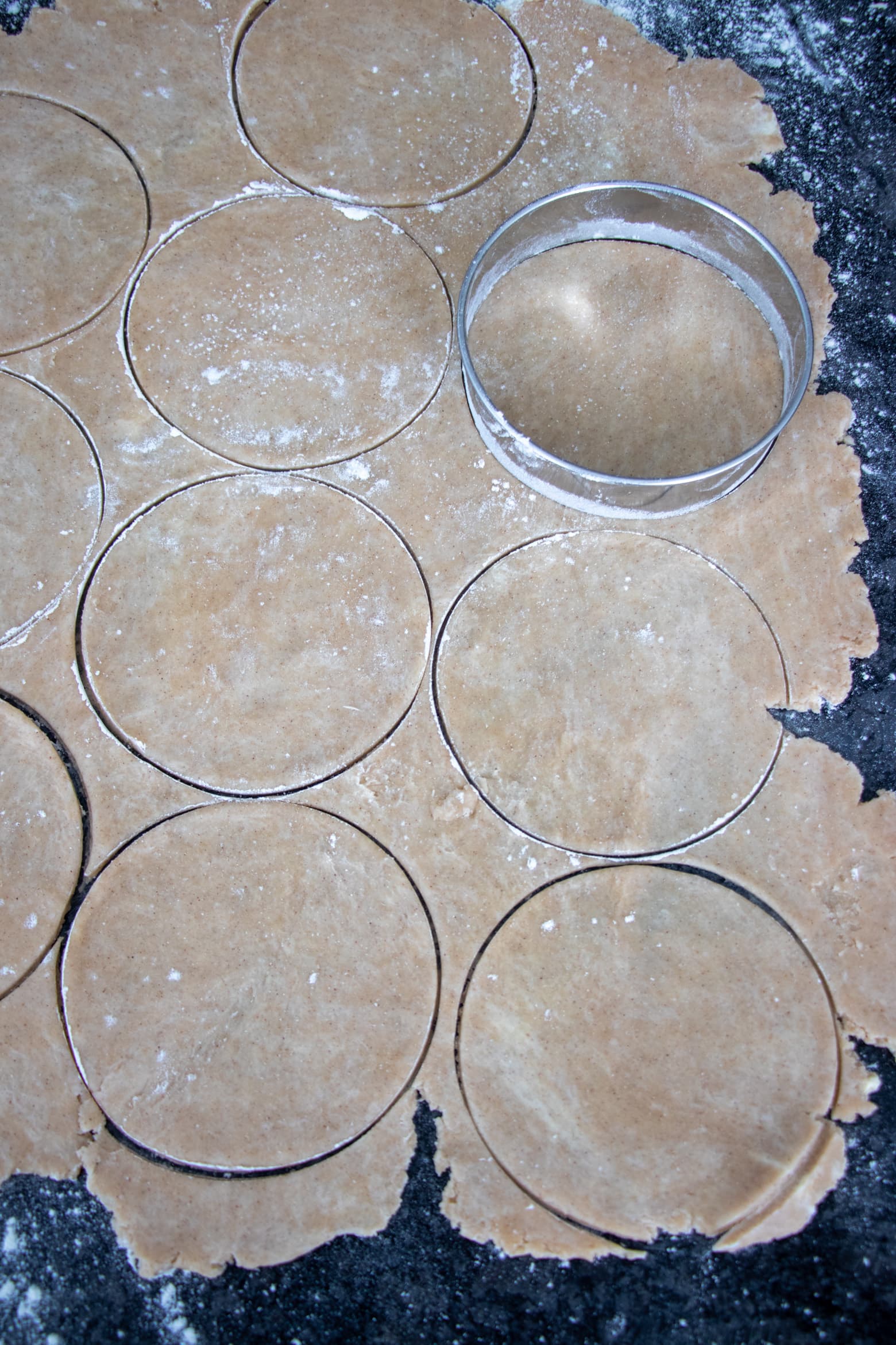 Biscuit cutter cutting pie dough circles