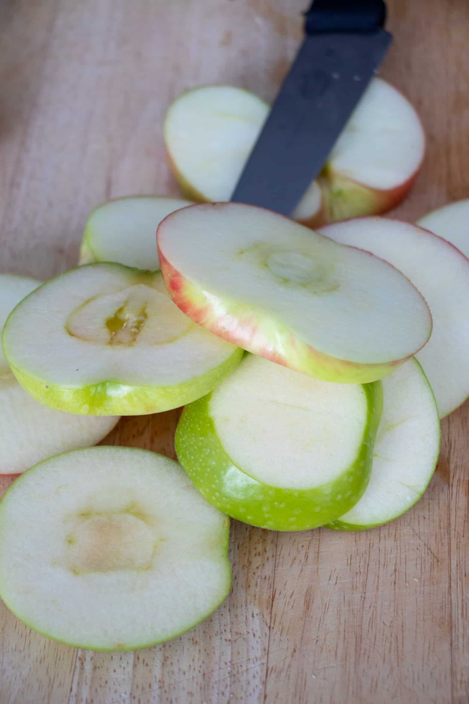 Sliced apples on a cutting board