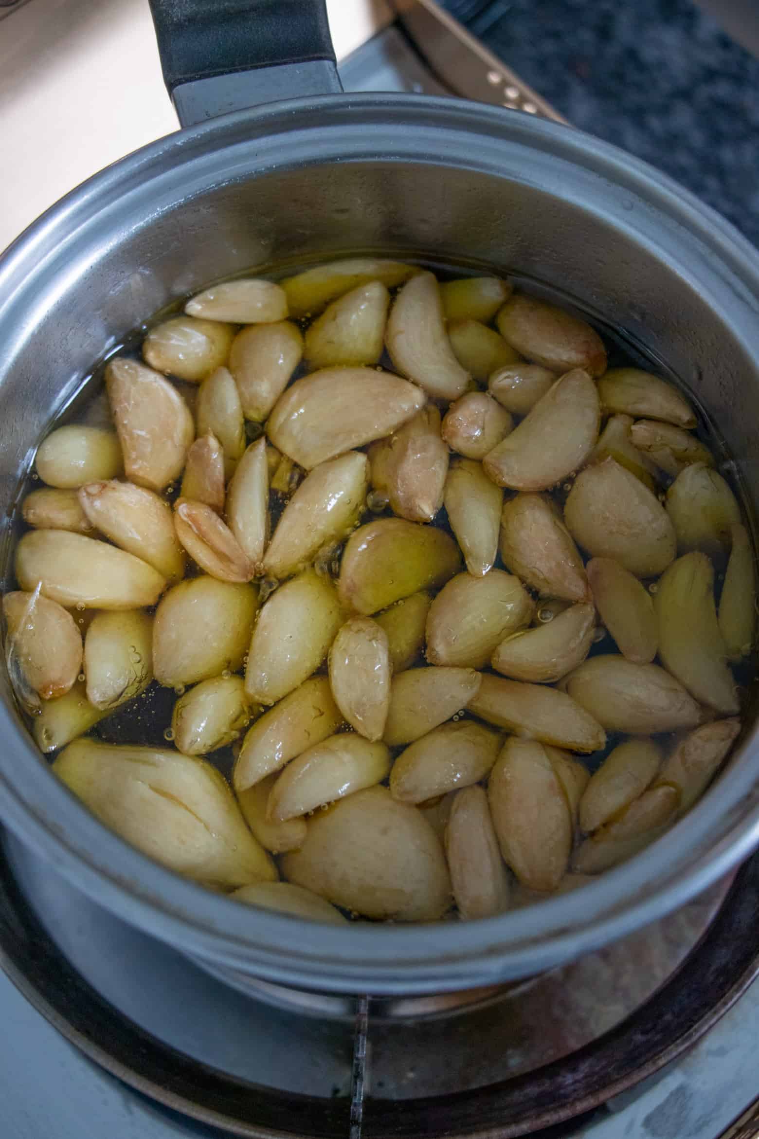 Cooked garlic confit in oil
