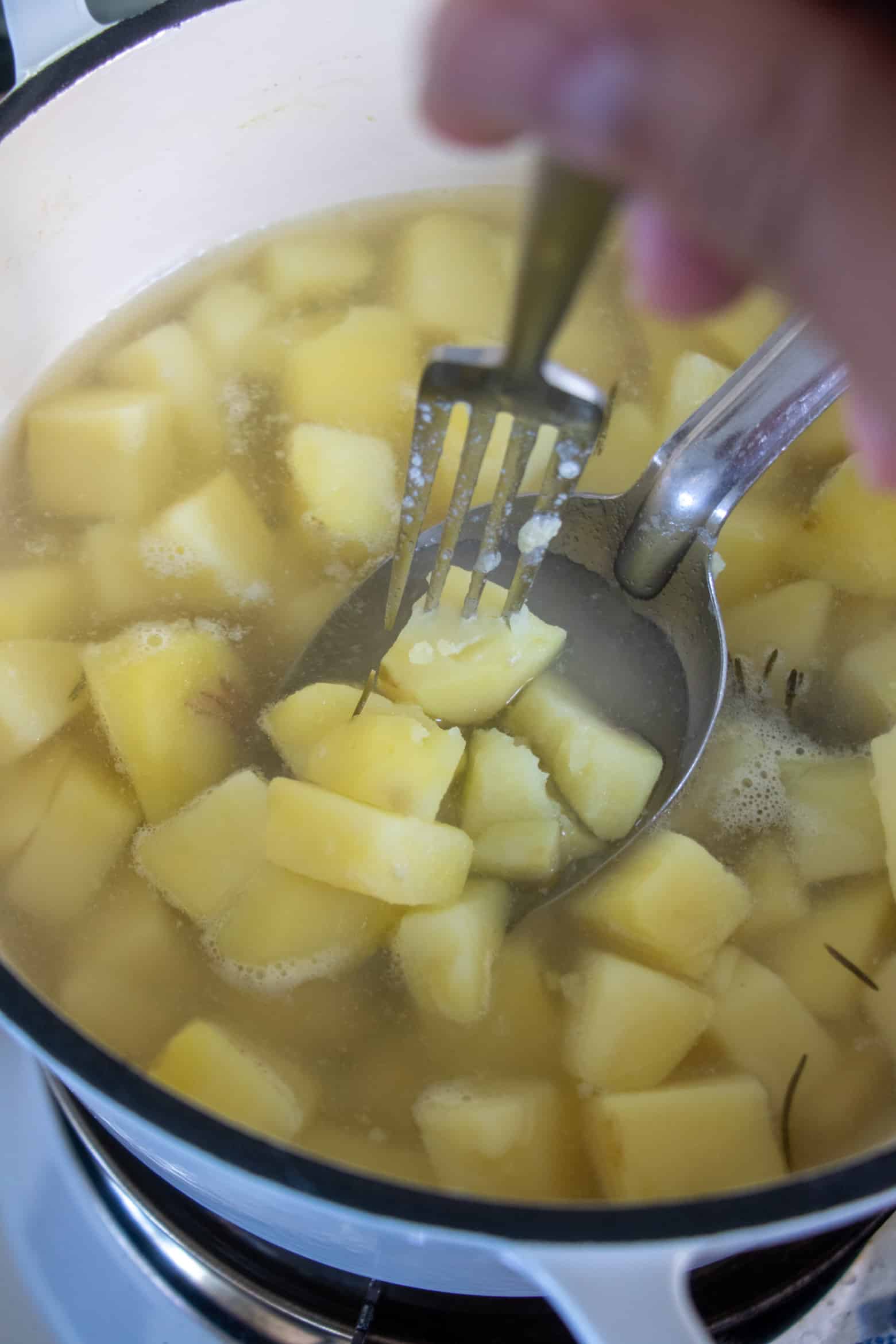 fork piercing tender potato
