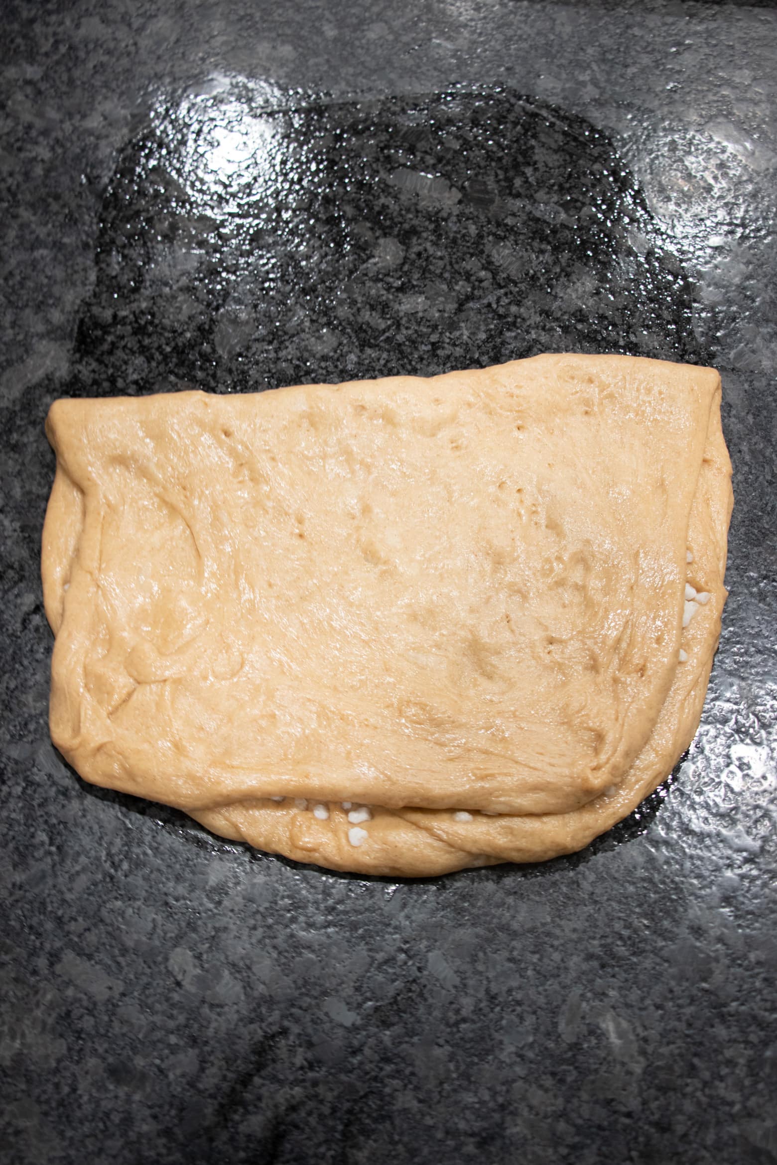 liege dough folded on top of itself.