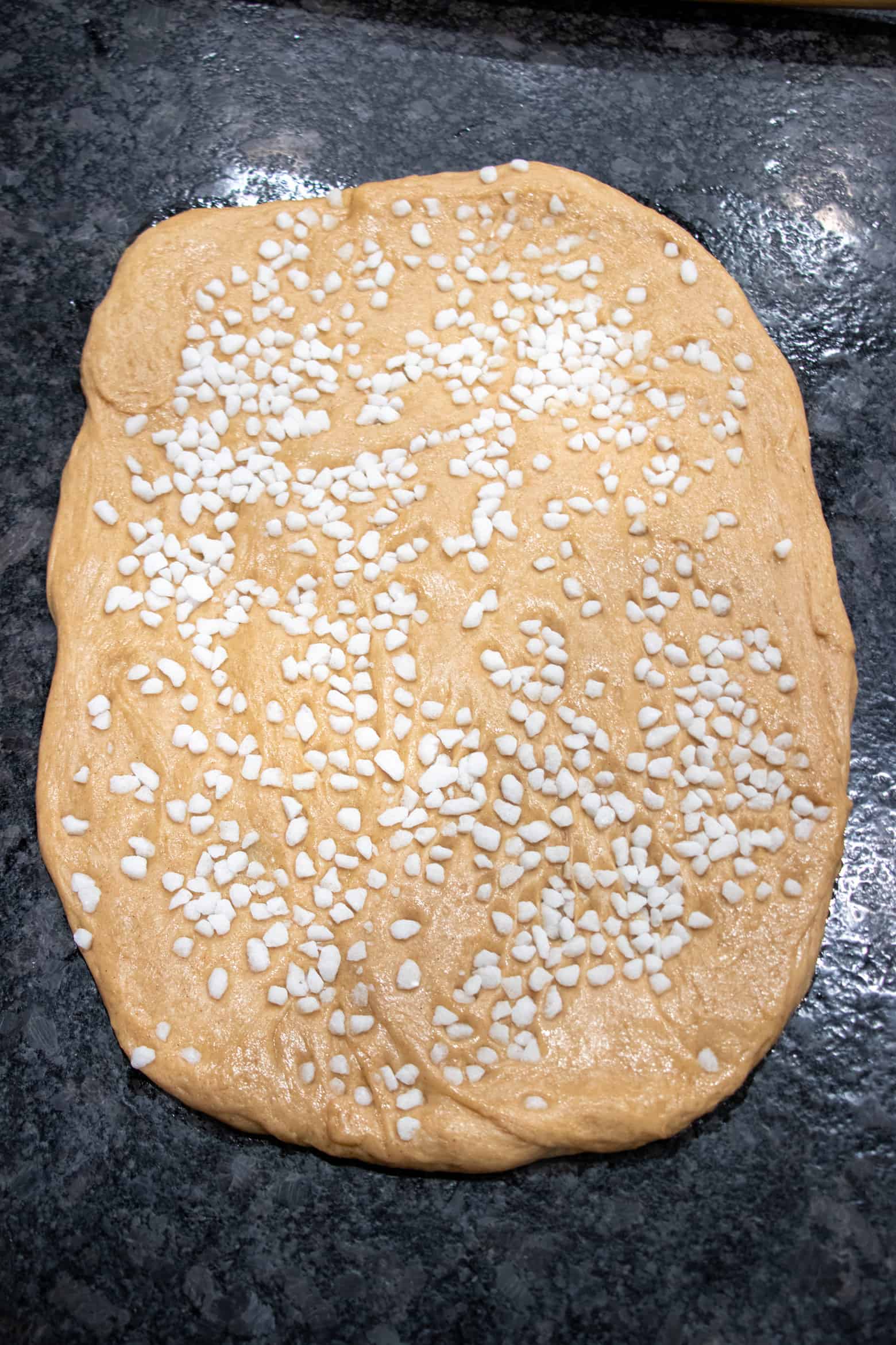 liege dough with pearl sugar pressed into it.