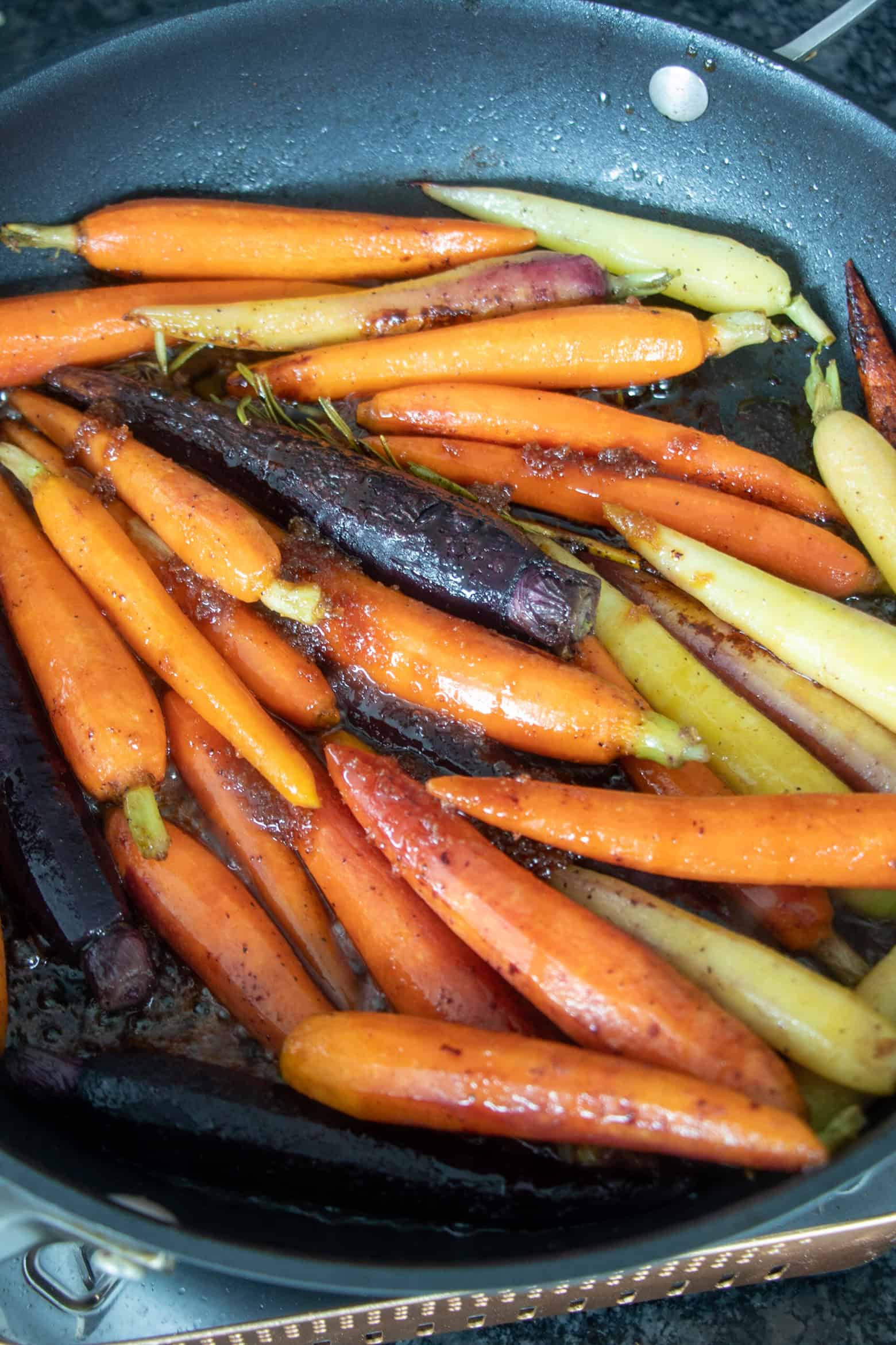Cooked sauteed carrots.