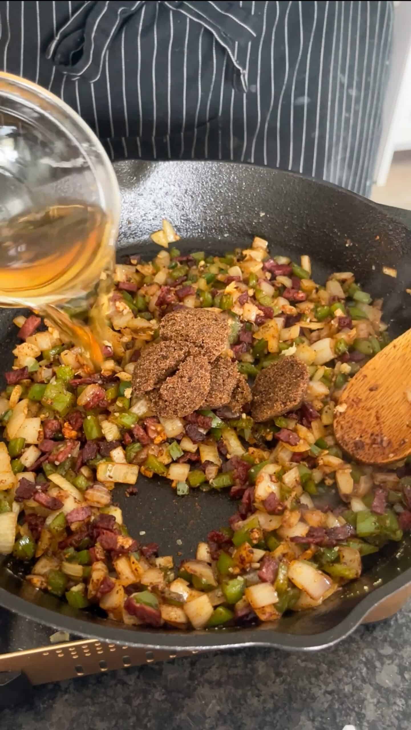 Brown sugar and apple cider vinegar added to the skillet.