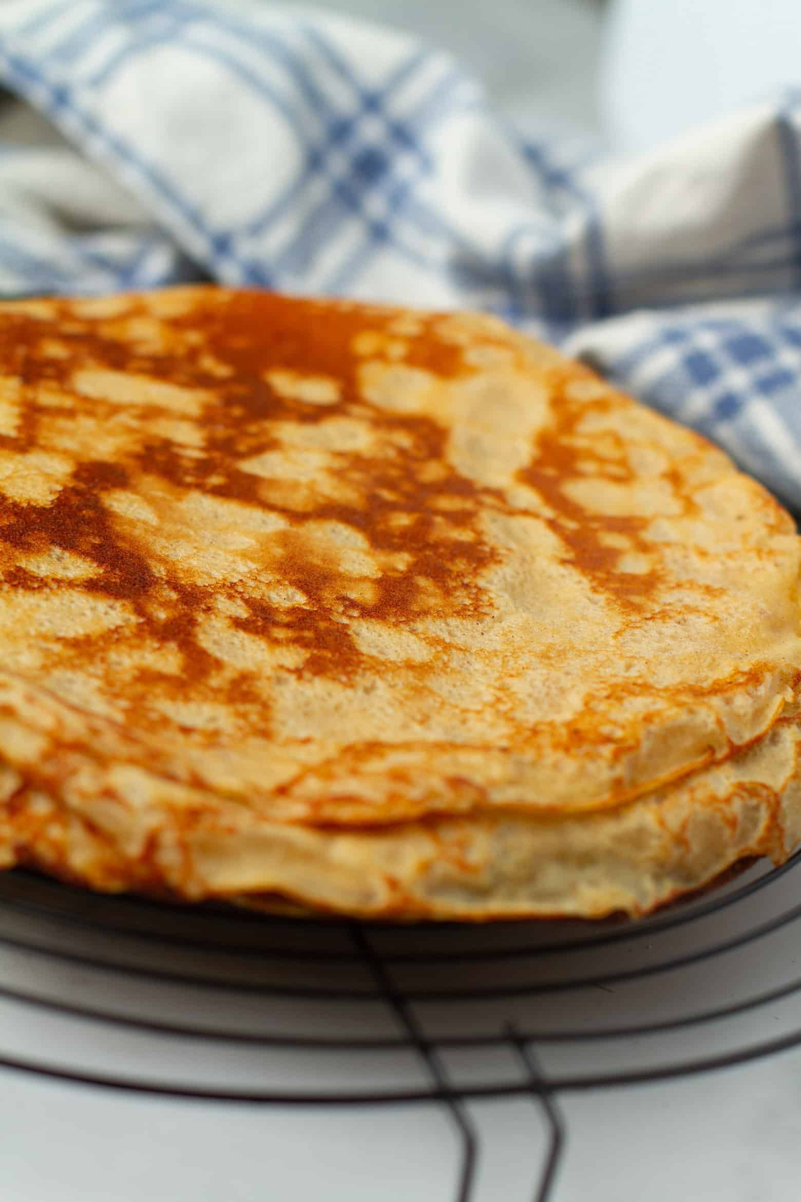 Crepes on a cooling rack.