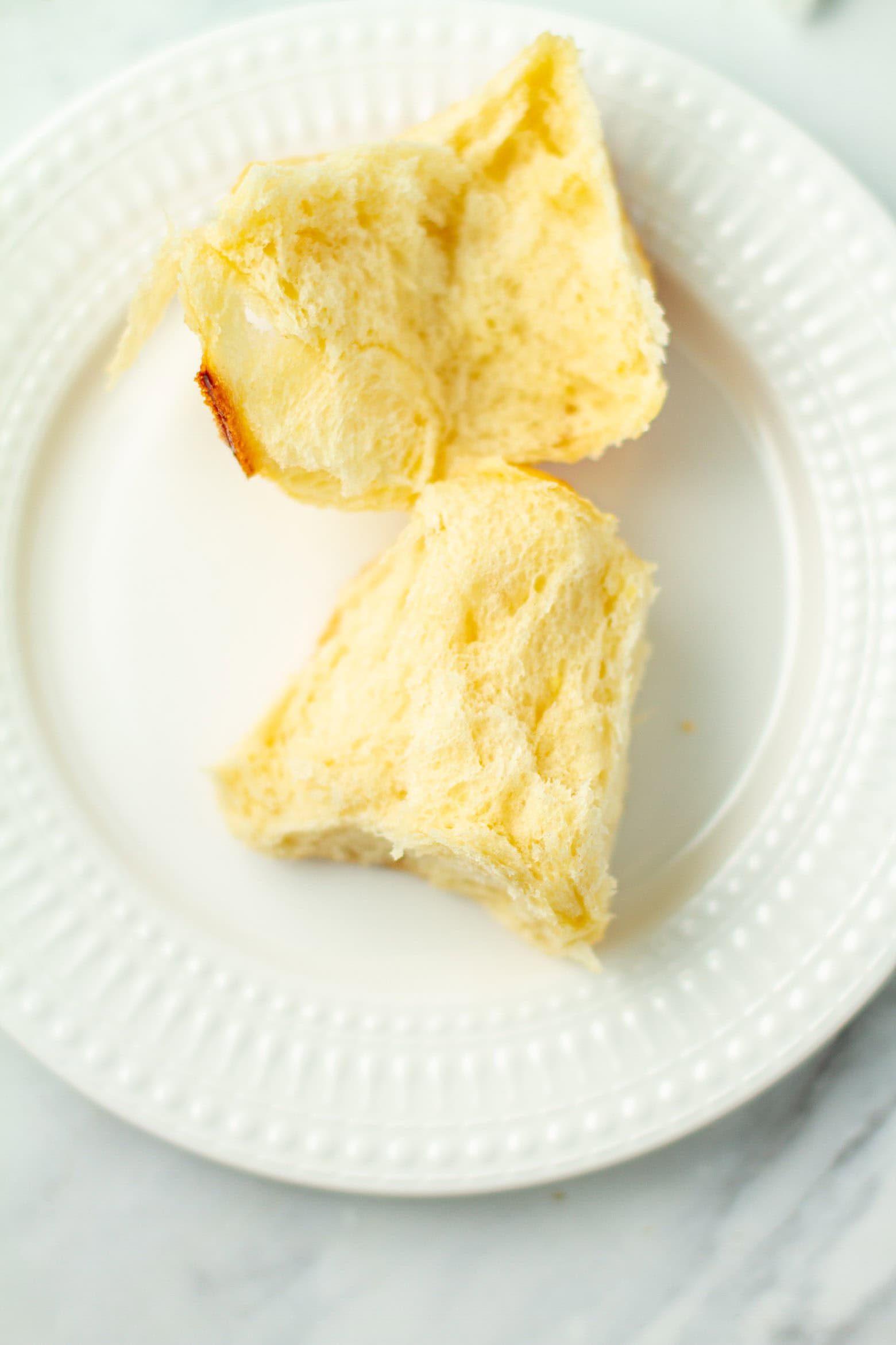 Split open Hawaiian roll.