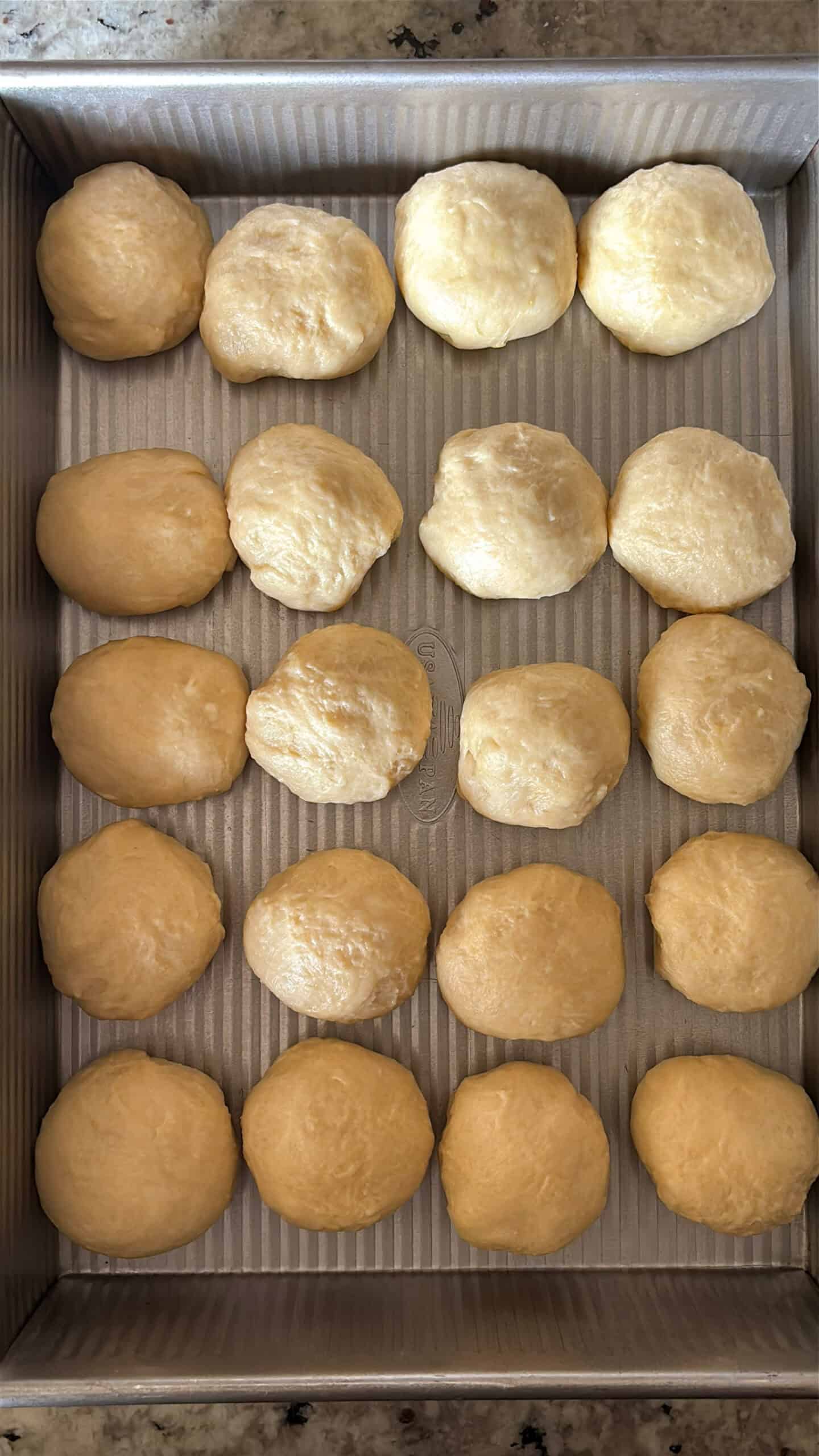Dough Balls unproofed in a baking pan.
