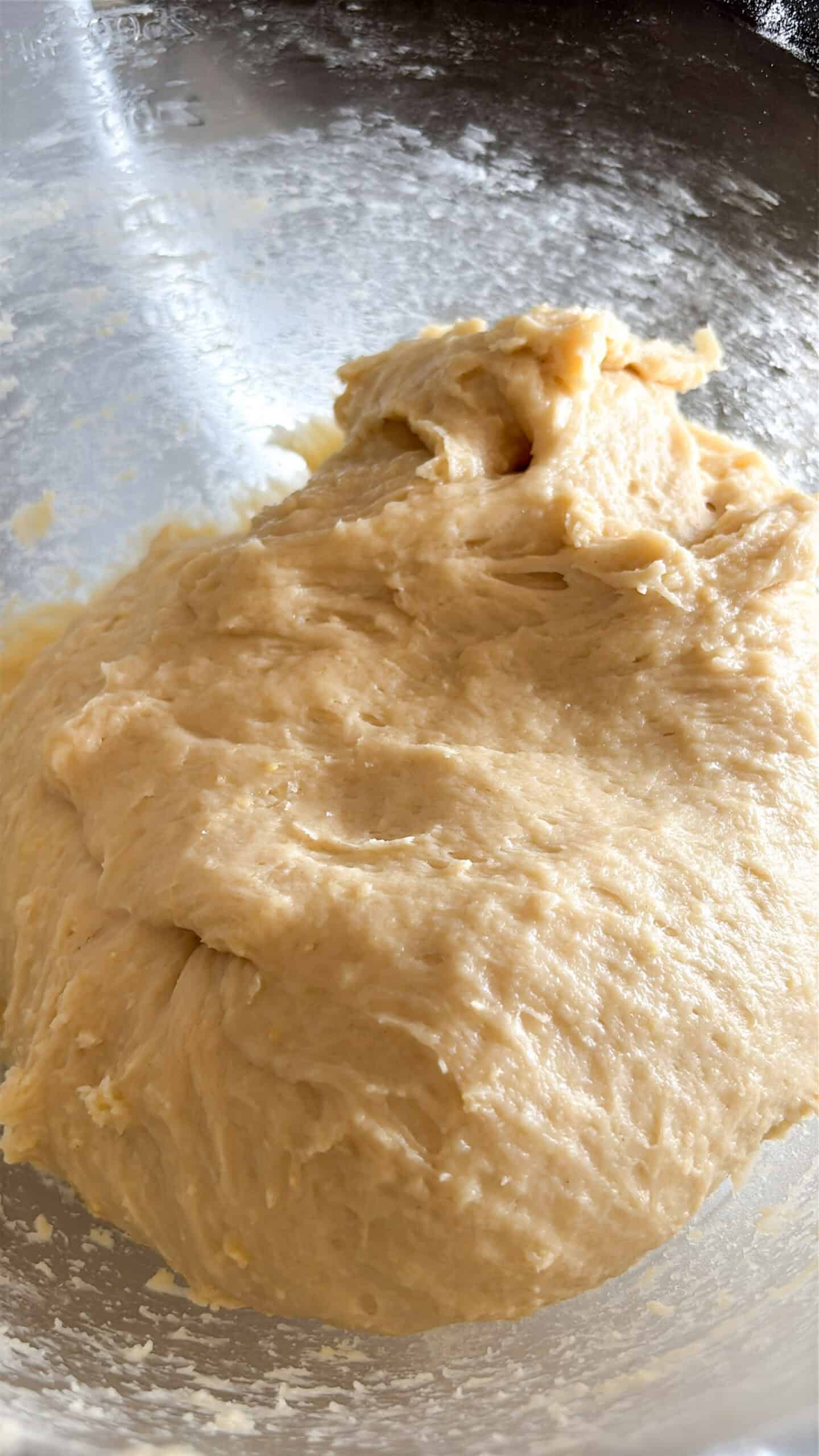 Finished dough in a mixing bowl.