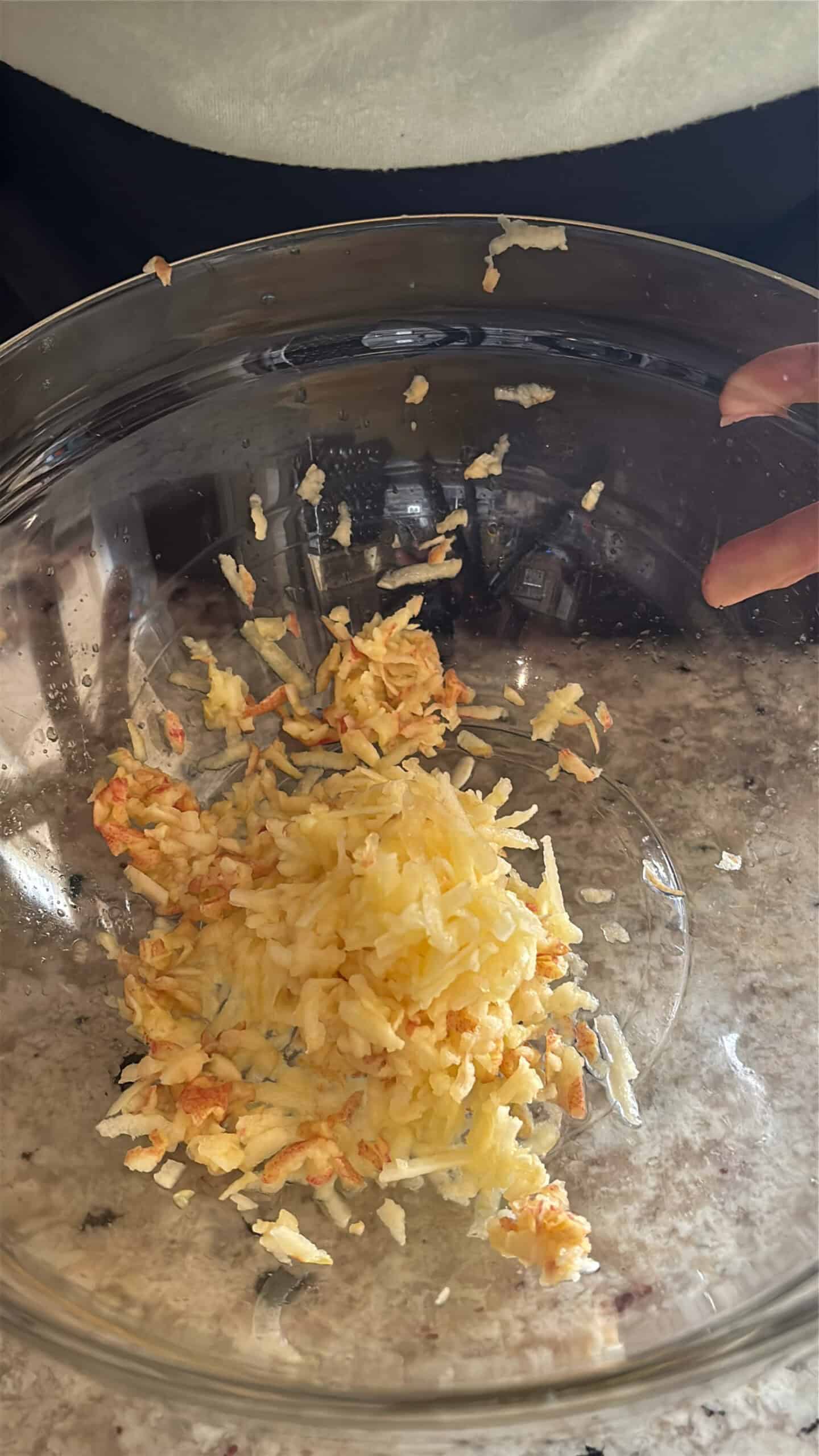 Grated apples in a bowl.