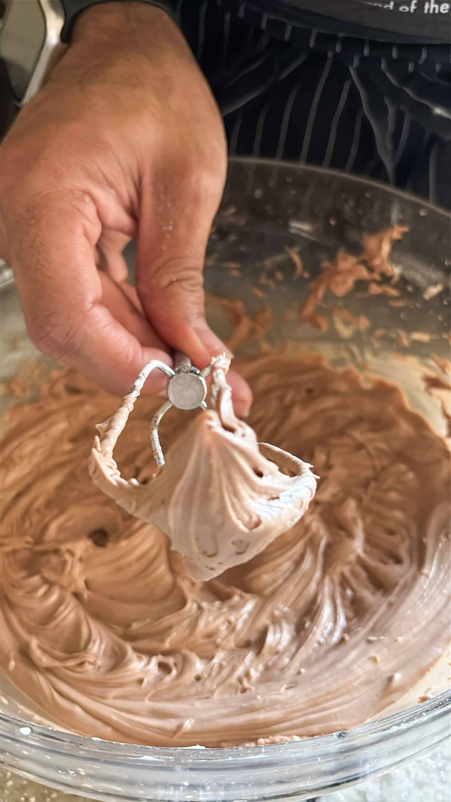Chocolate buttercream frosting whipped to a stiff peak.
