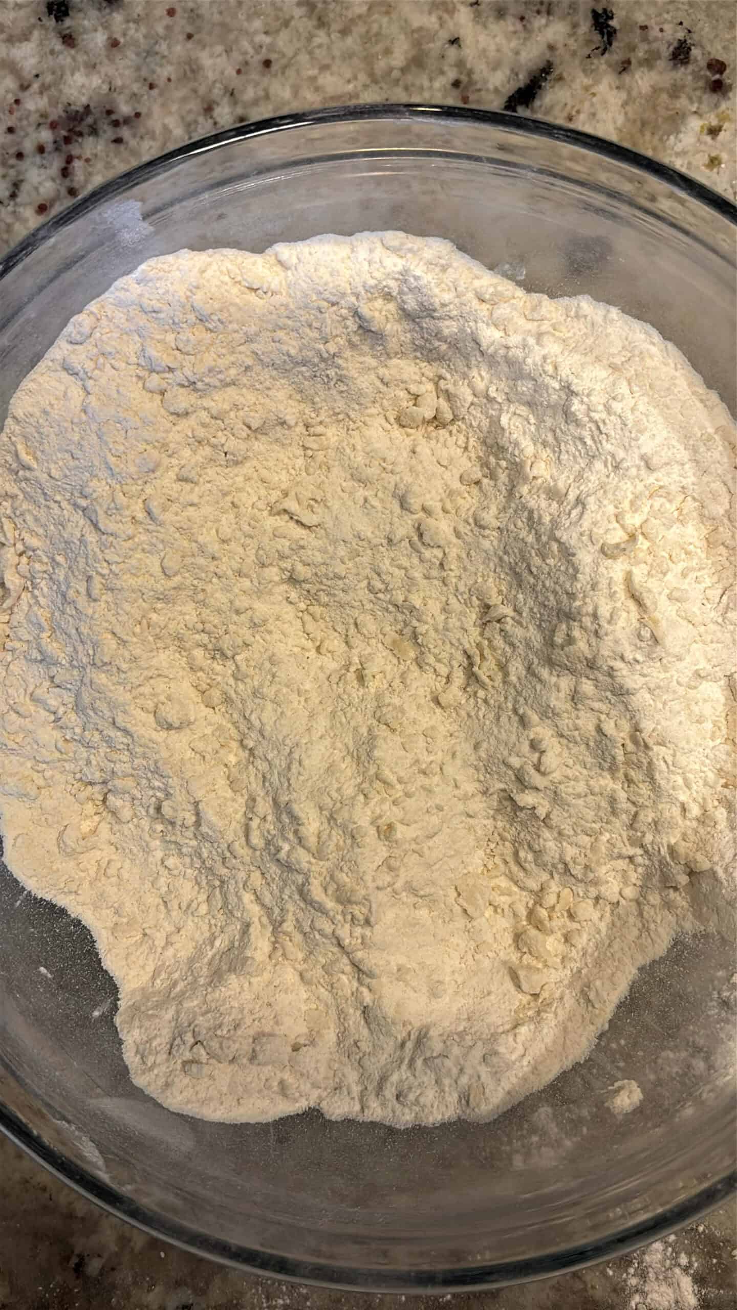 Pie dough dry ingredients in a bowl.