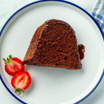 A slice of chocolate whiskey cake on a plate.