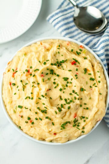 Dirty mashed potatoes in a large bowl.