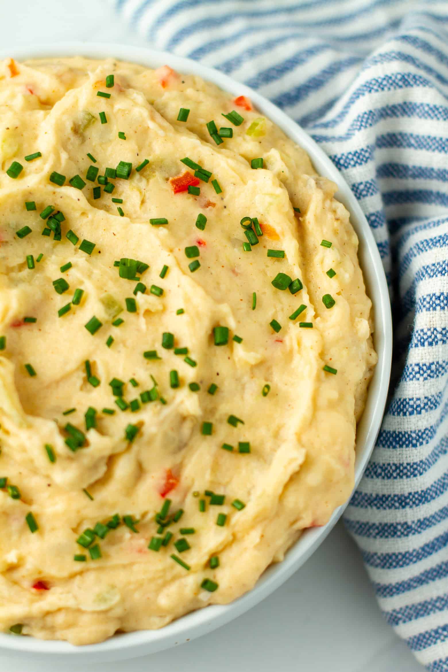 Dirty mashed potatoes in a large bowl.