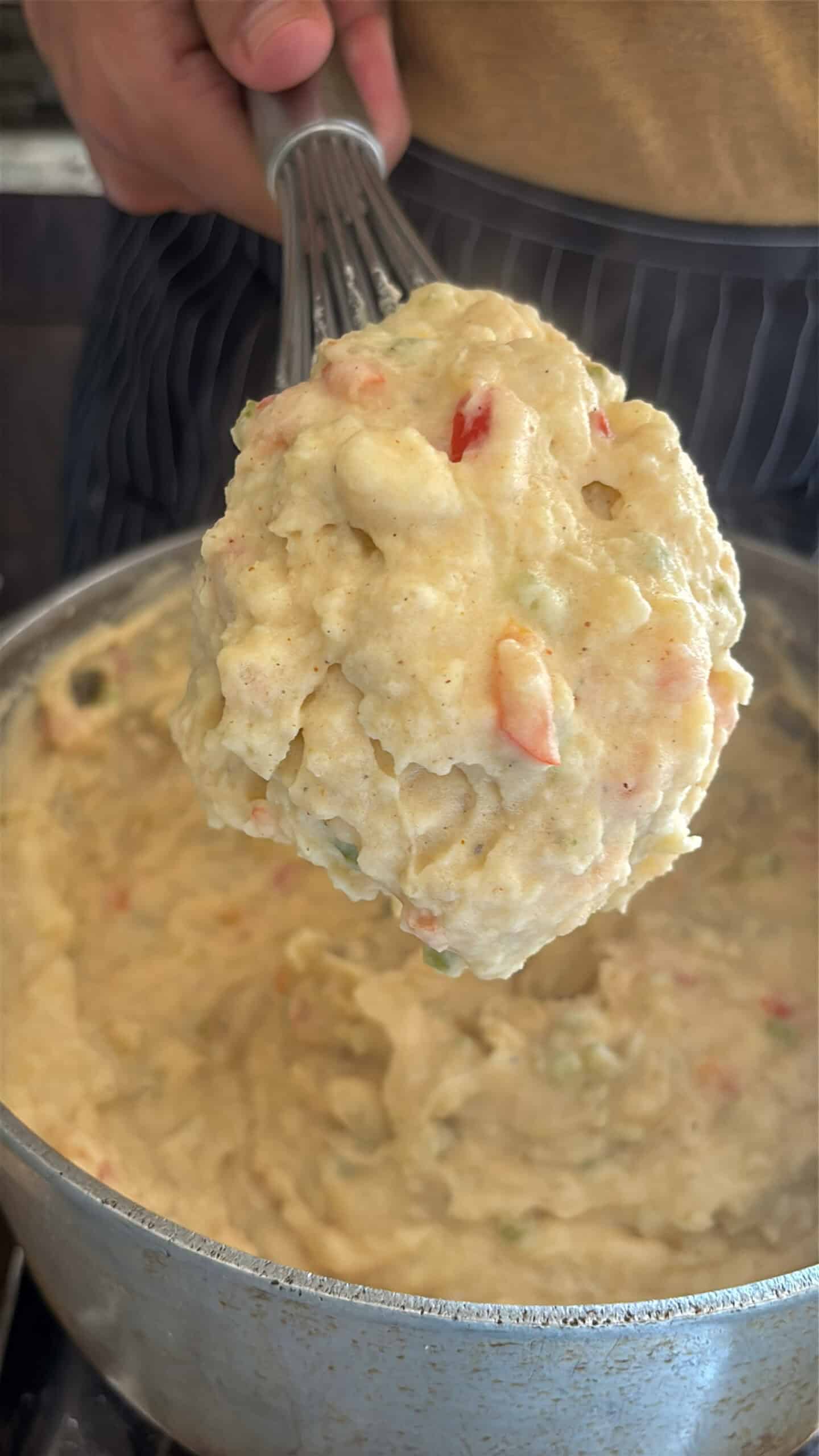 Whipped dirty mashed potatoes on a whisk.