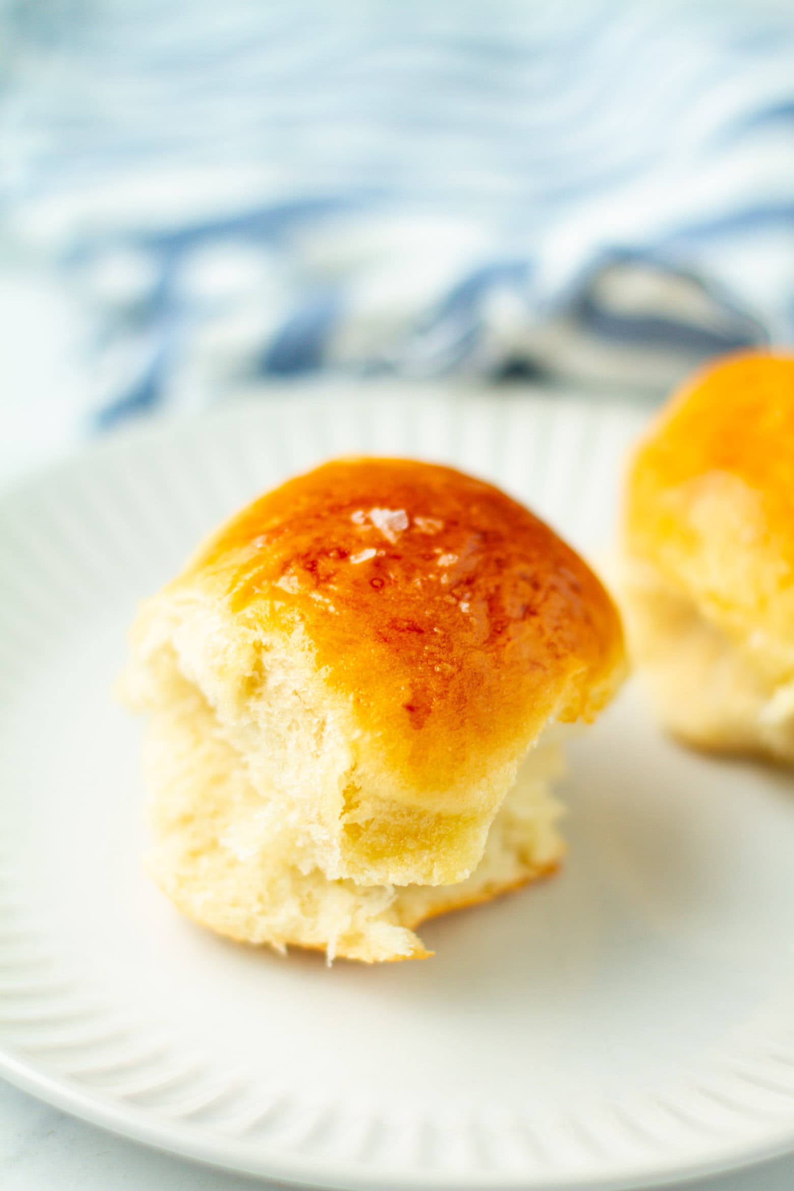 Honey butter roll on a plate.