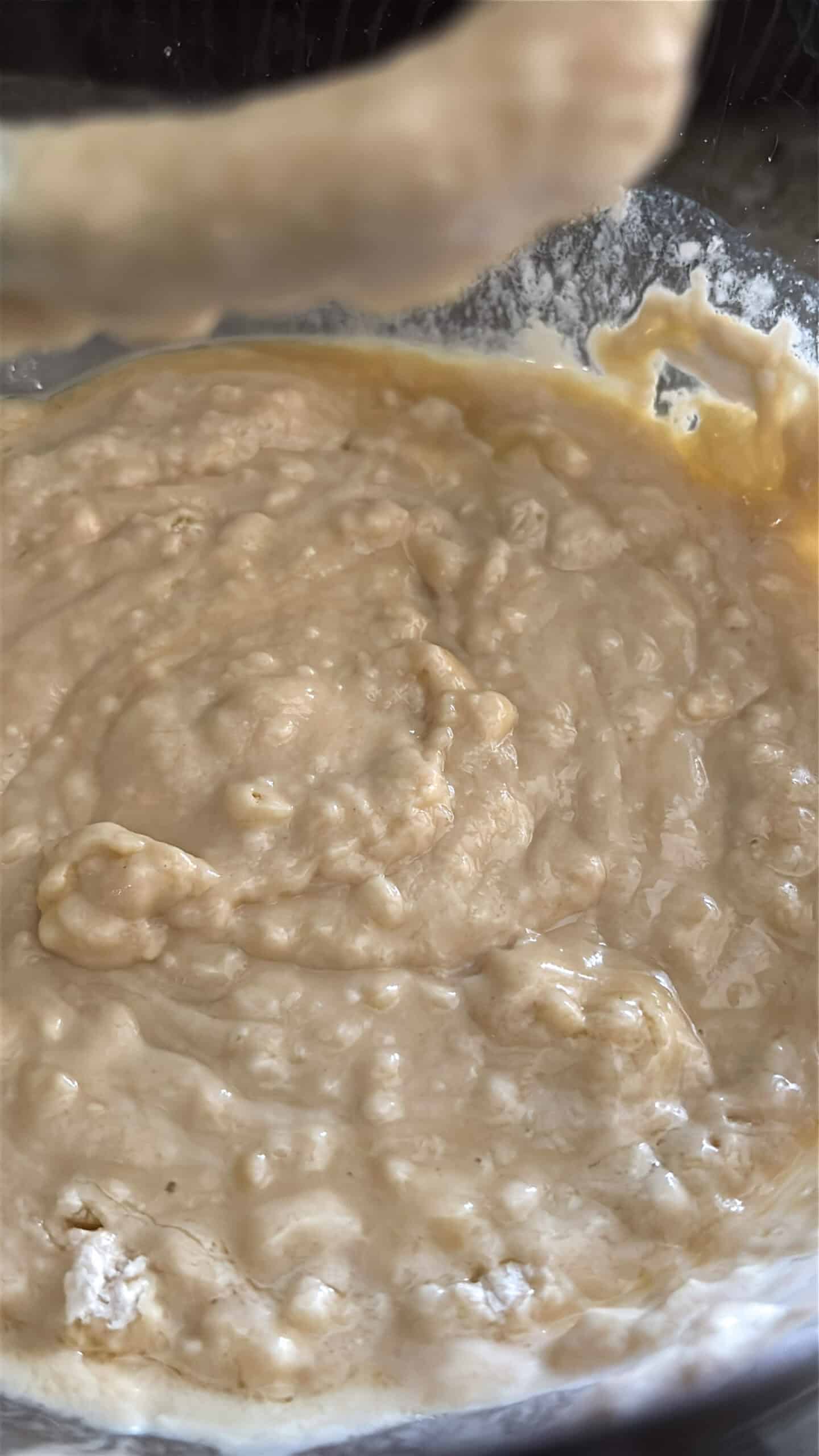 Wet dough mixing in bow.